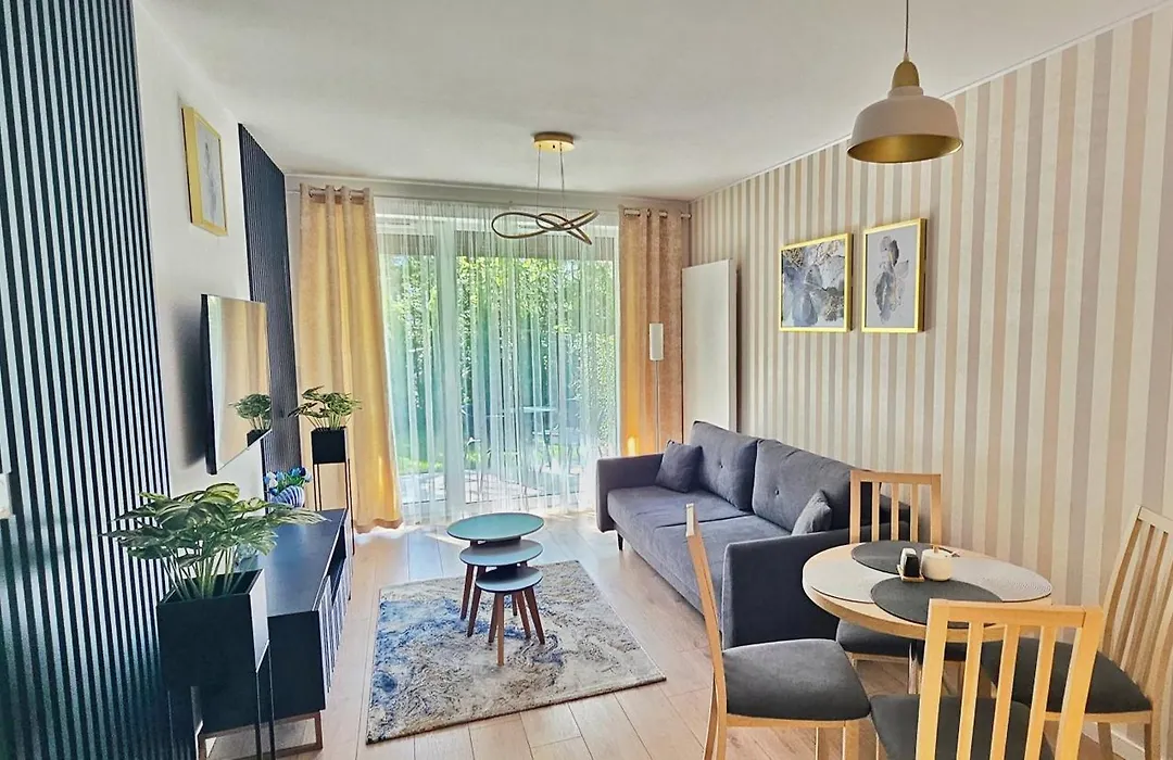 Apartament Whiteblue Kołobrzeg z dużym ogródkiem - 100 m od plaży! Whiteblue Kolberg Apartment mit großem Garten - 100 m vom Strand entfernt! Whiteblue Kołobrzeg Apartmán s velkou zahradou - 100 m od pláže!-1